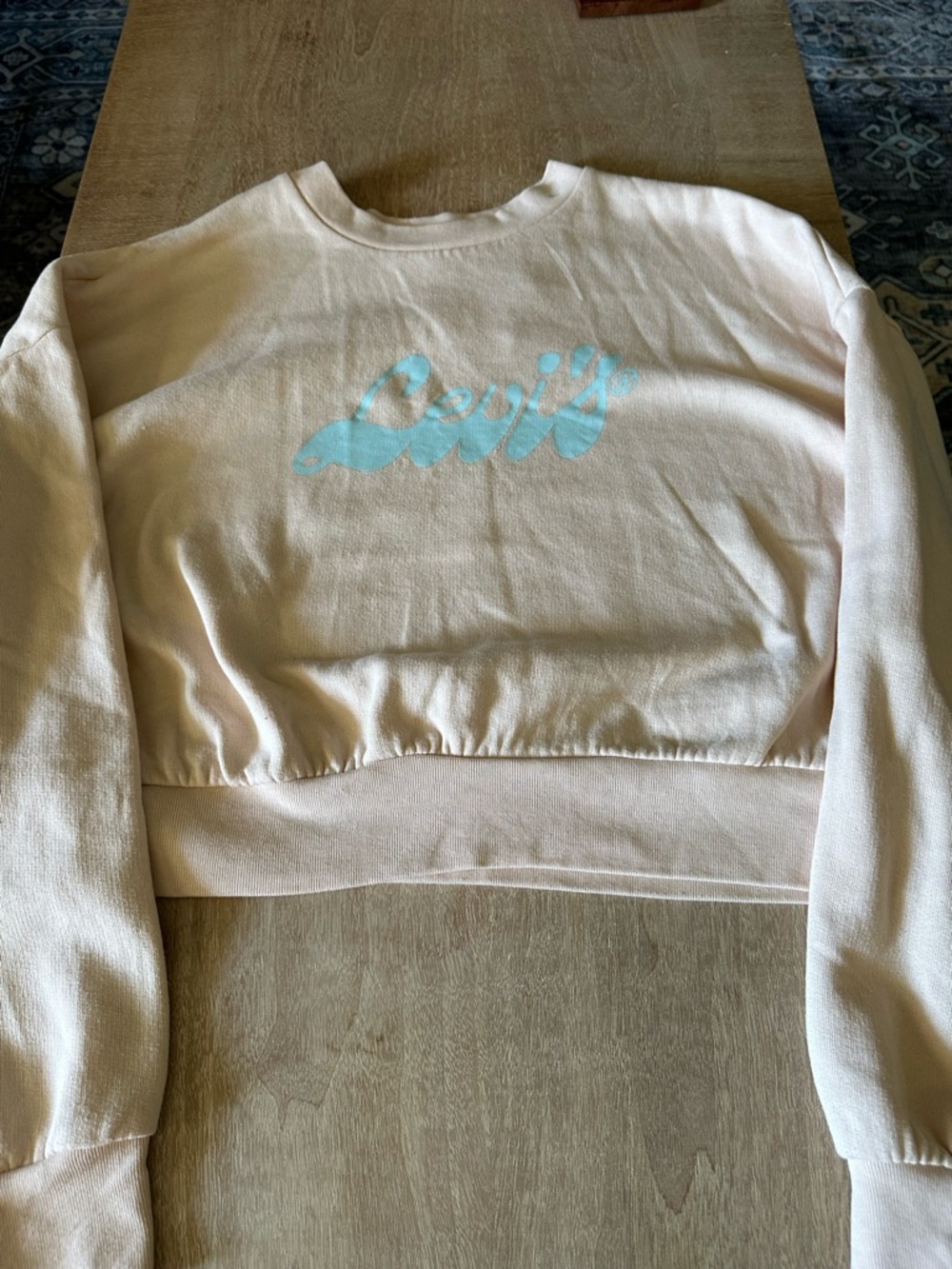 Levi's Cream Cropped Sweatshirt with Light Blue Logo